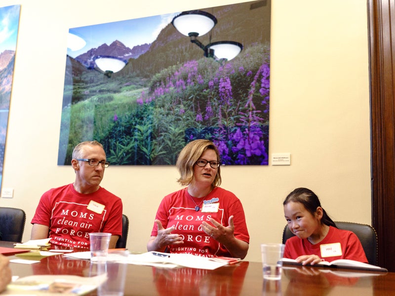 Steve, Afton and May Surwillo talk to Rocio Rodarte, Legislative Aide for Colorado Senator Michael F. Bennet, during an Earthjustice clean air fly-in meeting in the Russell Senate Office Building in Washington D.C.